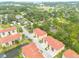 Overhead view of condo community with ponds and green spaces, providing a scenic and peaceful environment at 5041 Royal Palms Way # 203, New Port Richey, FL 34652