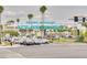 Historic downtown New Port Richey entrance with traffic and palm trees in the background at 5041 Royal Palms Way # 203, New Port Richey, FL 34652