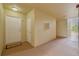 Condo hallway entrance with door number 203, a 