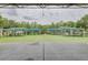 Covered picnic shelters in a well-maintained park, providing a comfortable gathering space for families and friends at 5041 Royal Palms Way # 203, New Port Richey, FL 34652