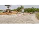 Local playground showing a play area with a slide, swings, and safe wood chip ground cover at 5041 Royal Palms Way # 203, New Port Richey, FL 34652