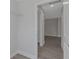 This walk-in closet has access to additional rooms, including a bedroom at 5214 Idlewild St, New Port Richey, FL 34653