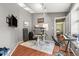 Office with multiple monitors, exercise equipment, and dark gray walls at 5422 Foley Sq, New Port Richey, FL 34652