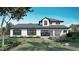 Spacious backyard with patio and a well-maintained lawn, perfect for outdoor entertaining and relaxation at 5457 Creek Ridge Rd, Brooksville, FL 34601