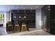 Modern kitchen with dark cabinets, marble countertops, stainless steel appliances and gold bar stools at 5477 Creek Ridge Rd, Brooksville, FL 34601