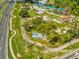 Aerial view of Weeki Wachee Springs park with waterpark, natural spring, and roadway at 6076 Shiprock Ave, Spring Hill, FL 34608