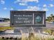 Welcoming Weeki Wachee Springs State Park sign with lush landscaping and a sunny sky at 6076 Shiprock Ave, Spring Hill, FL 34608