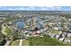 Aerial view of canal-front homes in a coastal community offering a unique waterfront lifestyle at 6340 Spoonbill Dr, New Port Richey, FL 34652