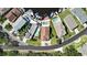 Aerial view of a residential home showcasing the property layout and neighborhood at 6340 Spoonbill Dr, New Port Richey, FL 34652