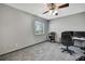 Office featuring carpet, chair, desk and window at 6340 Spoonbill Dr, New Port Richey, FL 34652