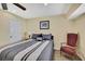 Comfortable bedroom featuring wood-look flooring and neutral wall color at 6340 Spoonbill Dr, New Port Richey, FL 34652