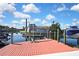 A waterfront home features a private boat dock, perfect for boating enthusiasts and enjoying waterfront living at 6340 Spoonbill Dr, New Port Richey, FL 34652
