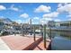 A waterfront home features a private boat dock, offering easy access to the waterway and boating opportunities at 6340 Spoonbill Dr, New Port Richey, FL 34652