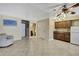 Spacious living room with tile flooring and convenient kitchenette at 6340 Spoonbill Dr, New Port Richey, FL 34652