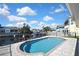 Sparkling pool and peaceful canal views create a serene backyard oasis, ideal for relaxation and recreation at 6340 Spoonbill Dr, New Port Richey, FL 34652