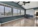 Sun Room with dark blue walls, table and chairs at 6340 Spoonbill Dr, New Port Richey, FL 34652