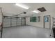 Spacious garage with a door, window and ample room for parking at 642 Erin Way, Brooksville, FL 34601