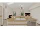 Kitchen with bar overlooking living room with fireplace at 642 Erin Way, Brooksville, FL 34601