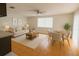 Comfortable living room with tile flooring and plenty of natural light at 6450 Limerick Ave, New Port Richey, FL 34653