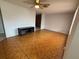 Spacious living room featuring stylish tile flooring and ample natural light at 6450 Limerick Ave, New Port Richey, FL 34653