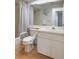 Bathroom with bathtub, shower, toilet, and sink, offering basic amenities at 6490 Pine Meadows Dr, Spring Hill, FL 34606