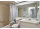 Bathroom featuring a bathtub, shower, toilet, and vanity, designed for essential needs at 6490 Pine Meadows Dr, Spring Hill, FL 34606