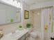 Traditional bathroom with a shower-tub combination and neutral-toned tile at 6583 River Run Blvd # 21005, Weeki Wachee, FL 34607