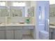 Updated bathroom featuring a sink vanity and separate toilet area at 6583 River Run Blvd # 21005, Weeki Wachee, FL 34607
