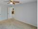 Bedroom with view through the doorway and tan carpeting at 6583 River Run Blvd # 21005, Weeki Wachee, FL 34607