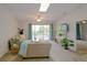 Inviting living room with a neutral color palette, lots of natural light and a sliding glass door to the balcony at 6583 River Run Blvd # 21005, Weeki Wachee, FL 34607