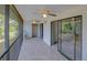 Wide view of screened porch with storage closet at 6583 River Run Blvd # 21005, Weeki Wachee, FL 34607