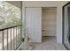 Enclosed porch featuring tiled floors and a storage closet at 6583 River Run Blvd # 21005, Weeki Wachee, FL 34607