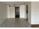 Bright dining room with tiled floors and a sliding barn door to another room at 7331 Sandalwood Dr, Port Richey, FL 34668