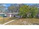 Charming single-story home featuring a cozy exterior and a well-maintained front yard at 7464 Acorn Cir, Spring Hill, FL 34606