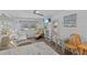 Bright living area featuring hardwood floors and comfortable seating with great natural light at 800 Chesapeake Dr # 42, Tarpon Springs, FL 34689