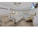 Relaxing living space with hardwood floors, comfortable seating, and bright windows for natural lighting at 800 Chesapeake Dr # 42, Tarpon Springs, FL 34689
