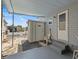 Home exterior with a storage shed and access to the front door at 800 Chesapeake Dr # 42, Tarpon Springs, FL 34689