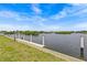 Scenic view of the calm waterfront with boat pilings on a bright, sunny day at 800 Chesapeake Dr # 42, Tarpon Springs, FL 34689