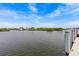 Waterfront view showing the pilings, clear blue sky and gorgeous water at 800 Chesapeake Dr # 42, Tarpon Springs, FL 34689