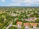 Beautiful aerial view of a single Gathering house in a lush green neighborhood at 8001 Summerbreeze Ter, Spring Hill, FL 34606