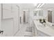 Bright bathroom with dual sinks, ample counter space, and a clean, modern design at 8001 Summerbreeze Ter, Spring Hill, FL 34606