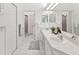 Bright bathroom with dual sinks, ample counter space, and a clean, modern design at 8001 Summerbreeze Ter, Spring Hill, FL 34606