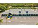 Well-maintained commercial building with ample parking and manicured landscaping at 8001 Summerbreeze Ter, Spring Hill, FL 34606