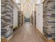 Stone pillars and wood-look floors at 8001 Summerbreeze Ter, Spring Hill, FL 34606