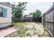 Large backyard with grass, fencing, and privacy at 803 Frances Dr, Tarpon Springs, FL 34689