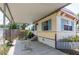 Charming single-story home with carport and landscaped front yard provides a welcoming curb appeal at 803 Frances Dr, Tarpon Springs, FL 34689