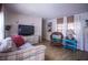 Open-concept living area offers seamless flow between kitchen and seating area at 803 Frances Dr, Tarpon Springs, FL 34689