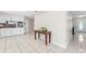 Bright kitchen featuring stainless appliances, and access to other living areas at 8749 Aruba Ln, Port Richey, FL 34668