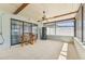 The screened in lanai provides a relaxing outdoor space at 8749 Aruba Ln, Port Richey, FL 34668