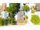 Aerial shot highlighting a home with a neutral roof, mature trees, and manicured surroundings in a quiet neighborhood at 9200 Lunar Ln, Port Richey, FL 34668